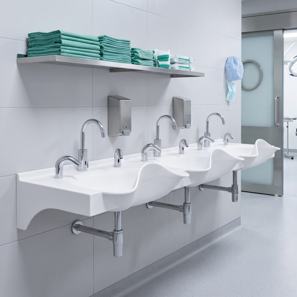 Flow Triple surgical scrub sink, made from Corian solid surface